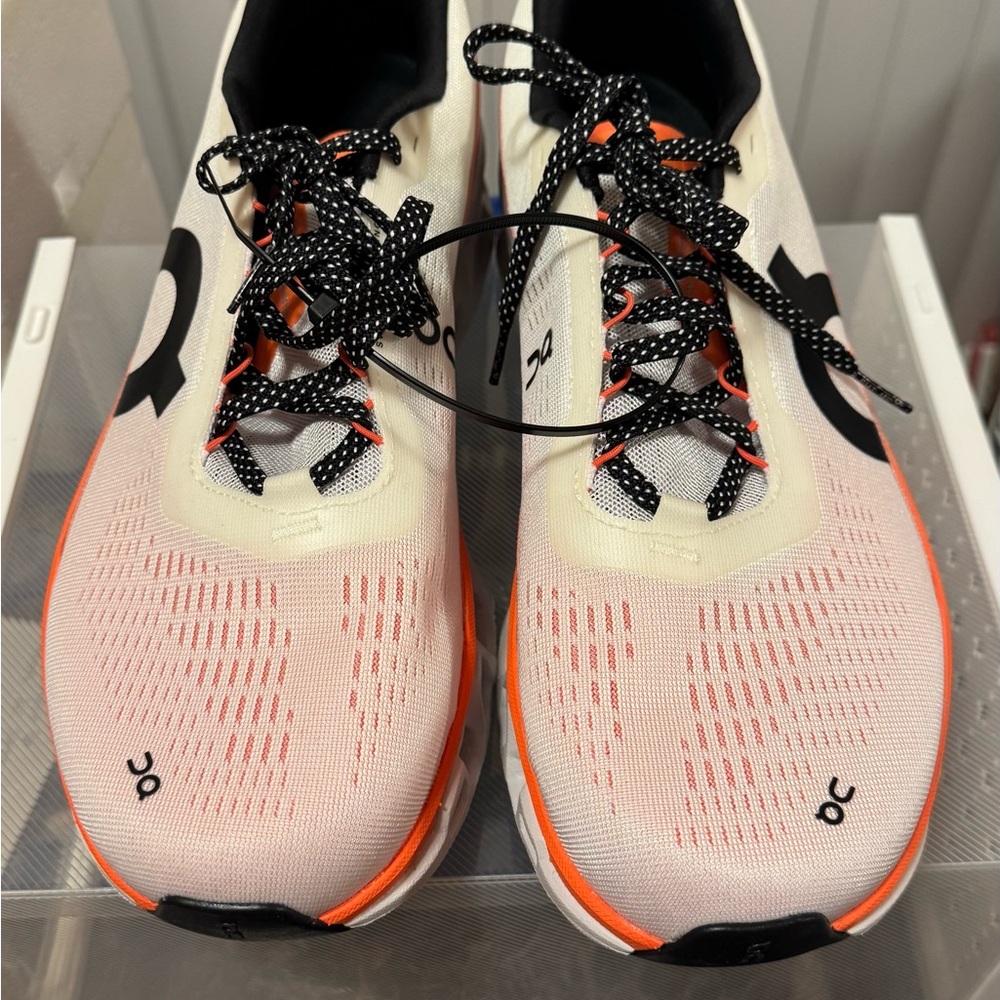 On Running Sneakers in White, Black, and Orange - Picture 2 of 5